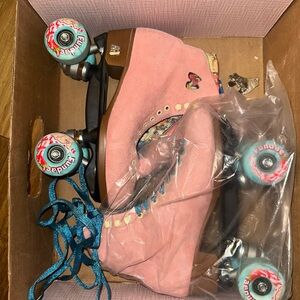 Strawberry Pink Moxi Rollerskates